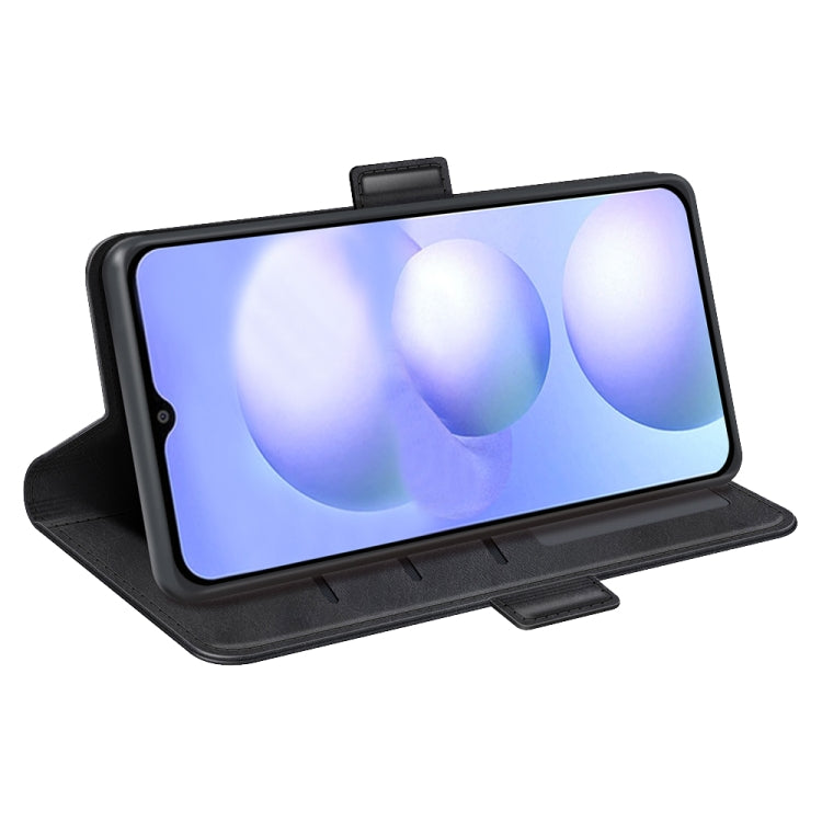 Black leather flip phone case in stand position with magnetic closure, screen visible