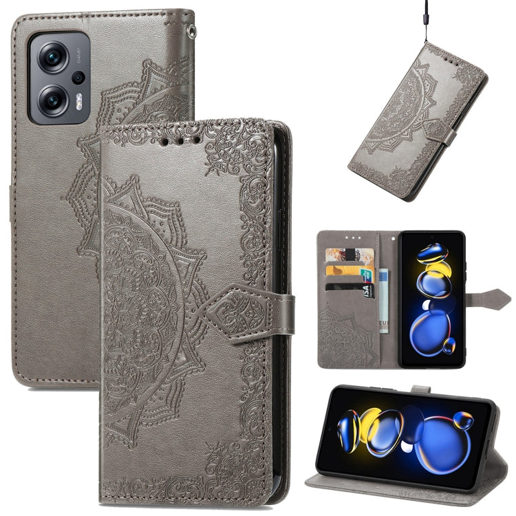 Gray mandala embossed flip leather phone case with card slots and magnetic closure