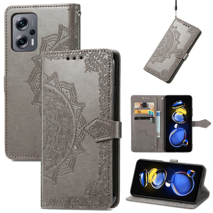 Gray mandala embossed flip leather phone case with card slots and magnetic closure