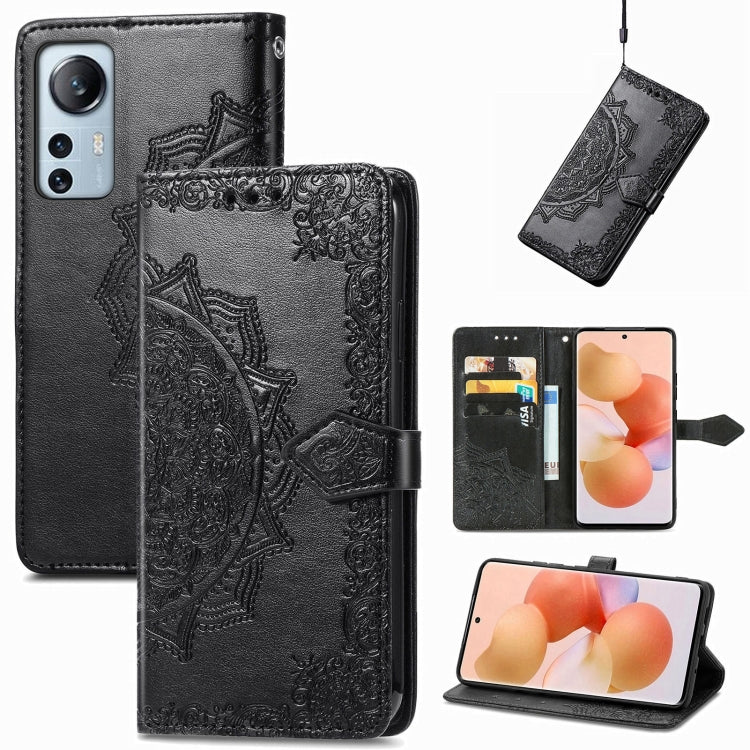 Black mandala embossed flip leather phone case with card slots and magnetic closure