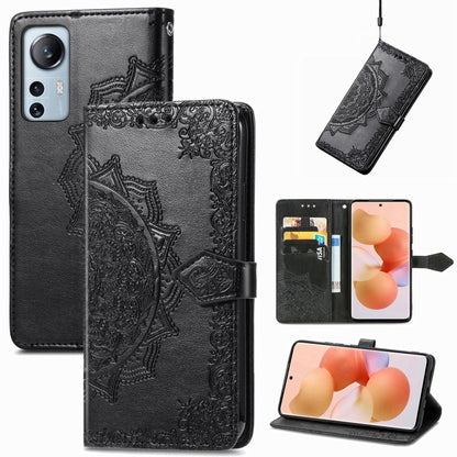 Black mandala embossed flip leather phone case with card slots and magnetic closure