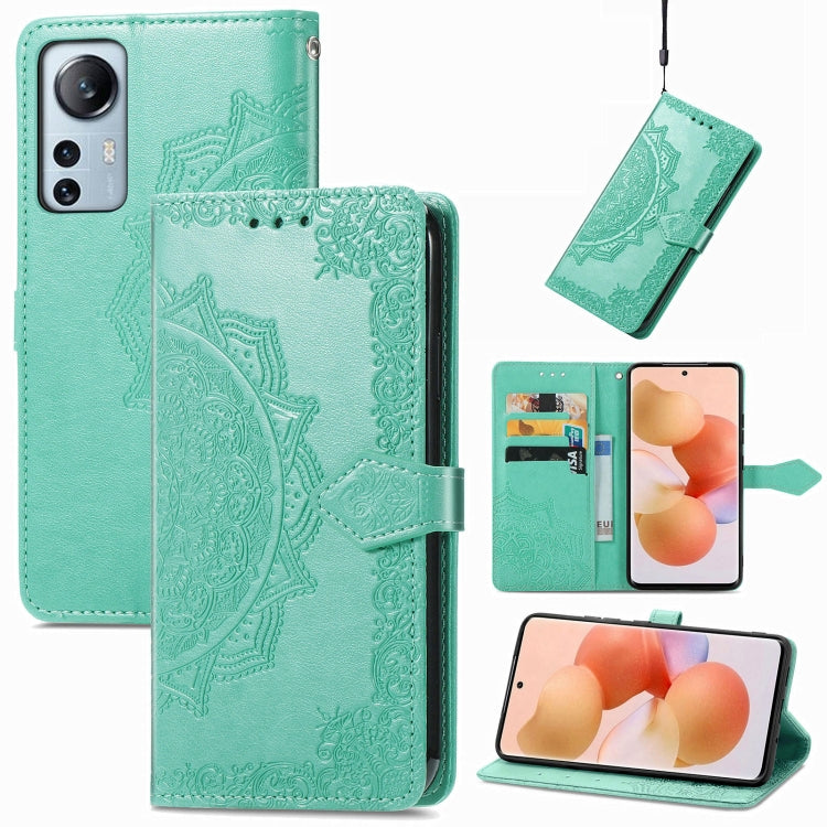 Mint green mandala embossed leather flip phone case with card slots and magnetic strap