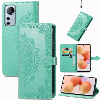 Mint green mandala embossed leather flip phone case with card slots and magnetic strap