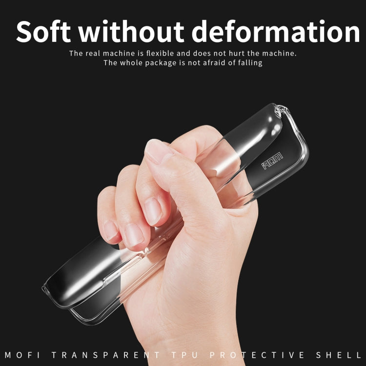 Clear flexible TPU phone case held in hand, with precise openings