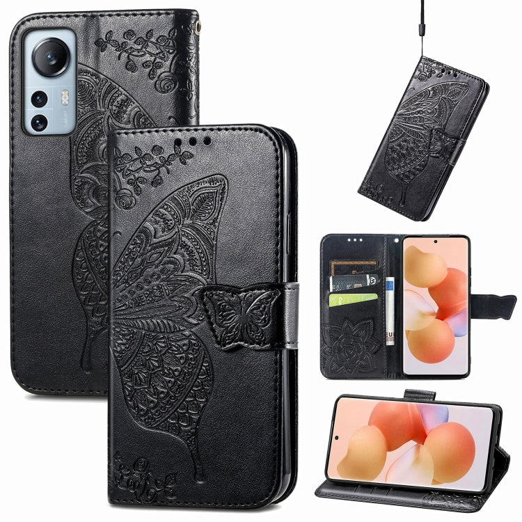 Black embossed leather flip phone case with butterfly and flower pattern, card slot
