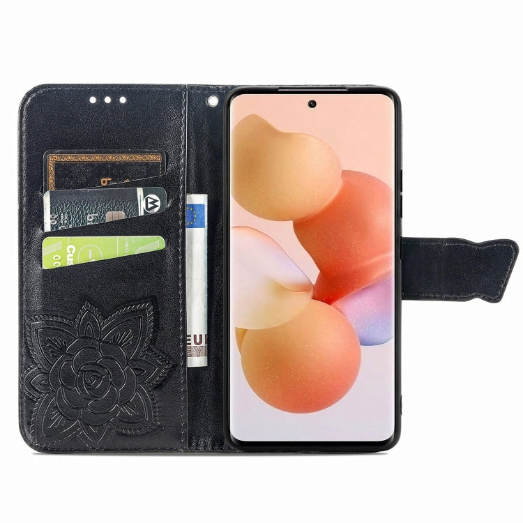 Dark embossed leather flip phone case with butterfly-and-flower pattern and inner card pockets