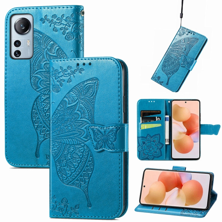 Blue embossed leather flip phone case with butterfly flower pattern and card pocket