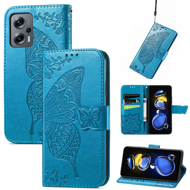 Blue embossed butterfly flip phone case with card slots and folio stand strap.