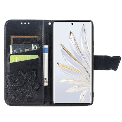 Dark blue embossed leather-style flip phone case with card slots and butterfly flower design
