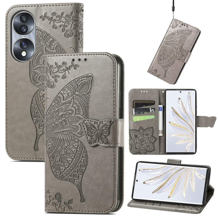 Gray embossed leather-style flip phone case with butterfly and floral relief, belt clip