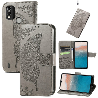 Gray embossed flip leather phone case with butterfly design and card slots