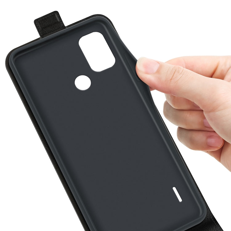 Nokia C21 Plus black textured vertical flip leather phone case back, hand holding close-up