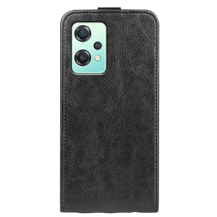 Black vertical flip leather phone case showing camera cutout and embossed texture