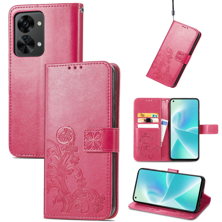 Rose red leather phone case with embossed floral pattern, buckle clasp, card slots, stand flap