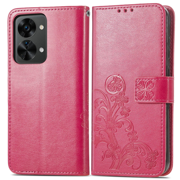 Rose red leather wallet phone case with embossed floral detail and magnetic buckle closure