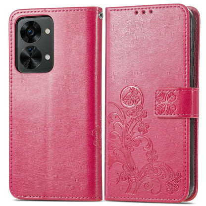 Rose red leather wallet phone case with embossed floral detail and magnetic buckle closure