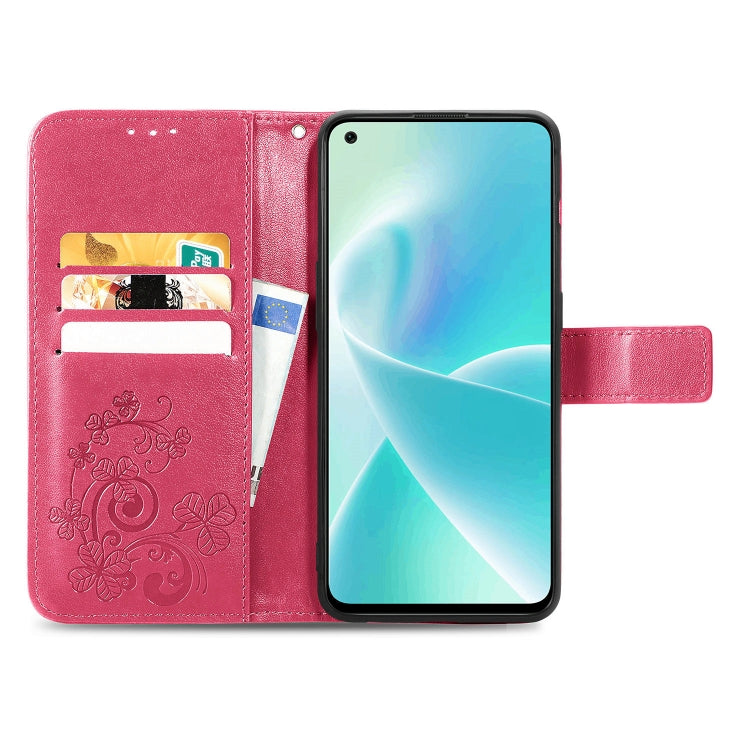 Rose red folio phone case with embossed floral pattern, card slots, and side strap