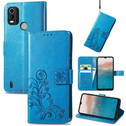 Blue leather phone case with embossed floral buckle clasp, flip cover and stand