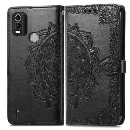 Black embossed leather mandala flip phone case, magnetic closure and side camera cutouts