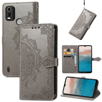 Gray embossed leather mandala flip phone case with card slots and side button openings