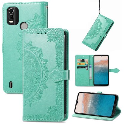 Green embossed leather mandala flip phone case with card slots and folio kickstand