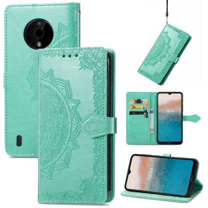 Teal embossed mandala leather folio phone case with magnetic strap and camera cutout