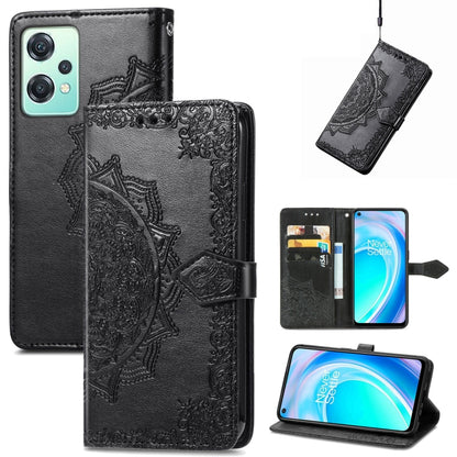 Black embossed mandala leather folio phone case with magnetic strap and camera cutout
