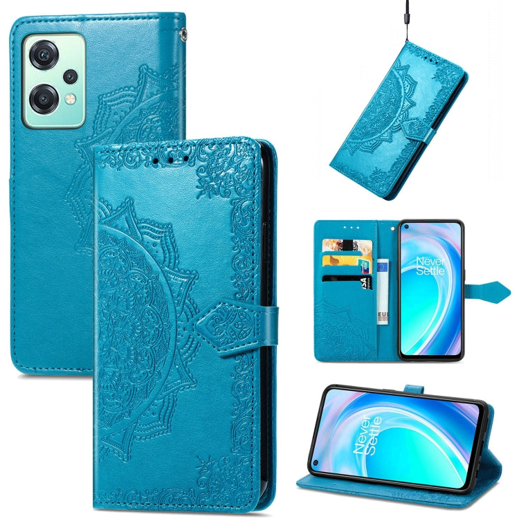Light blue embossed mandala leather folio phone case with magnetic strap and camera cutout