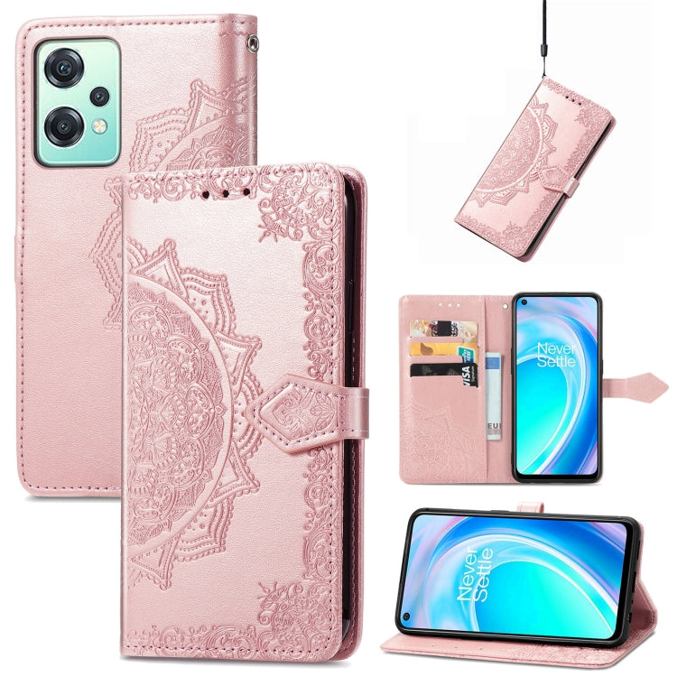 Pink embossed mandala leather folio phone case with magnetic strap and camera cutout