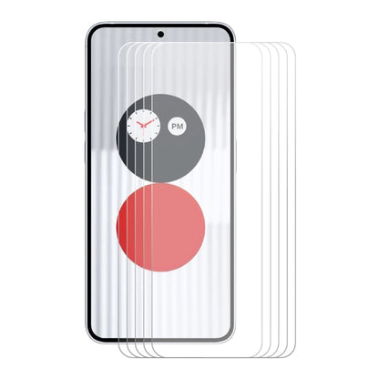 Tempered glass screen protector film set shown layered behind smartphone