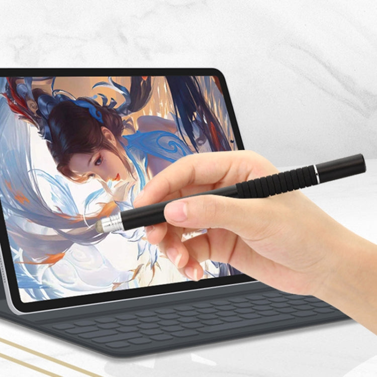 Black capacitive stylus pen with silver disc tip, used on a tablet screen