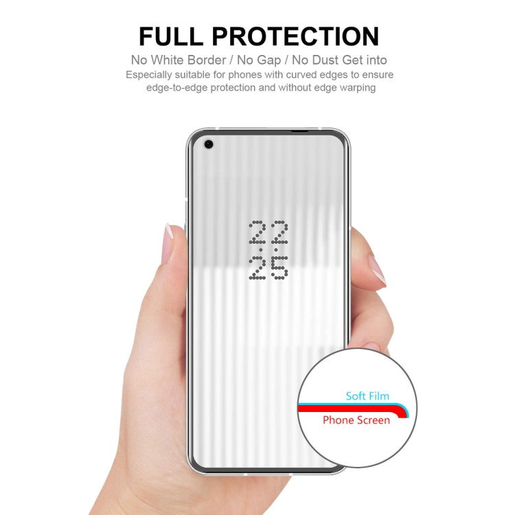 Screen protector film being aligned on a phone screen by hand for full protection