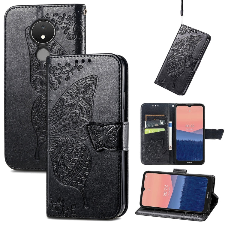Black flip phone case with embossed butterfly and floral pattern, leather wallet style