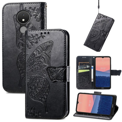 Black flip phone case with embossed butterfly and floral pattern, leather wallet style