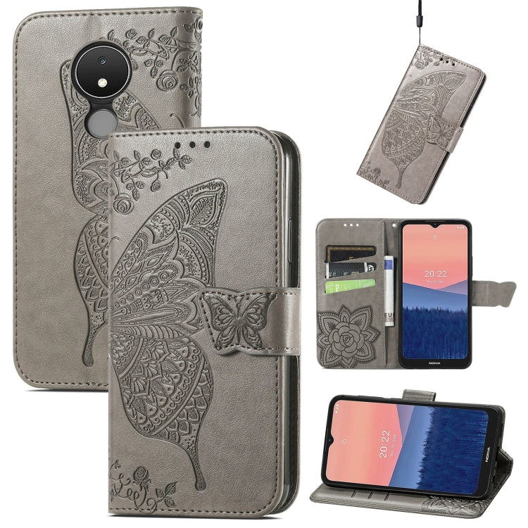 Gray flip phone case with embossed butterfly and floral design, leather wallet style