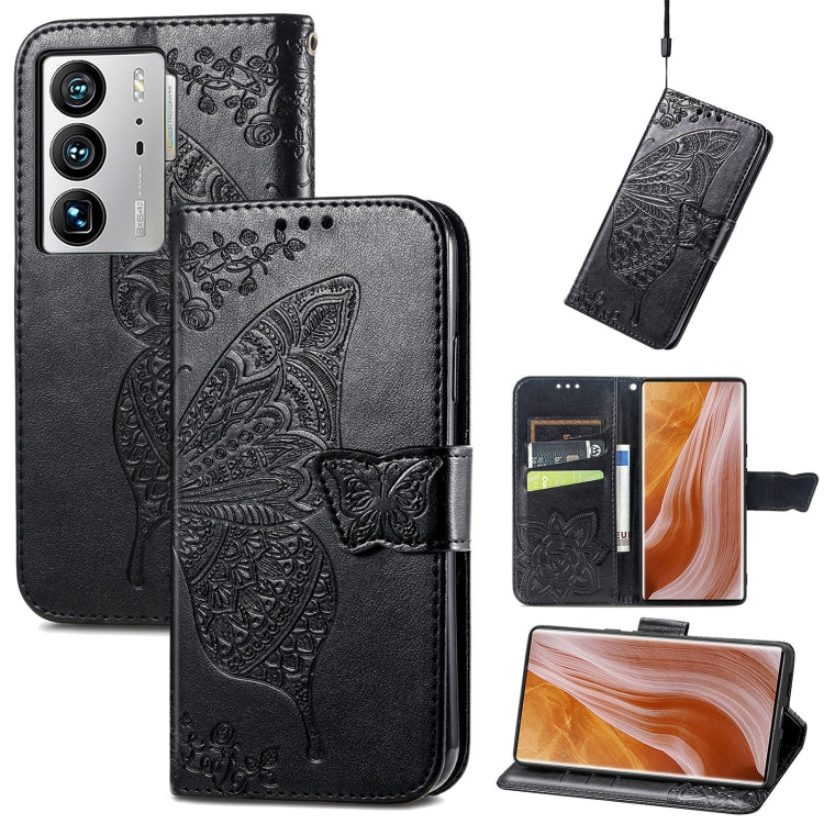 Black embossed flip leather-style phone case with butterfly and flower details, wallet flap