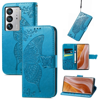 Blue embossed flip leather-style phone case with butterfly and flower details, wallet flap
