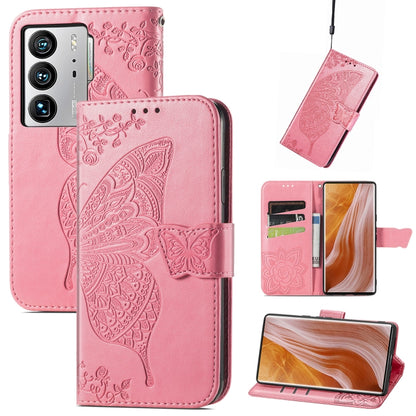 Pink embossed flip leather-style phone case with butterfly and flower details, wallet flap