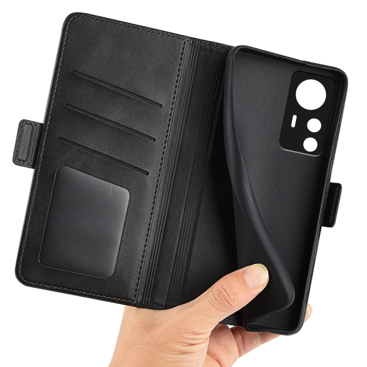 Black leather wallet phone case with card slot, magnetic buckle, open front view.