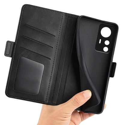Black leather wallet phone case with card slot, magnetic buckle, open front view.