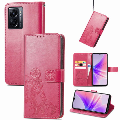 Magenta embossed leather-look phone case with four-leaf clasp buckle and card slots