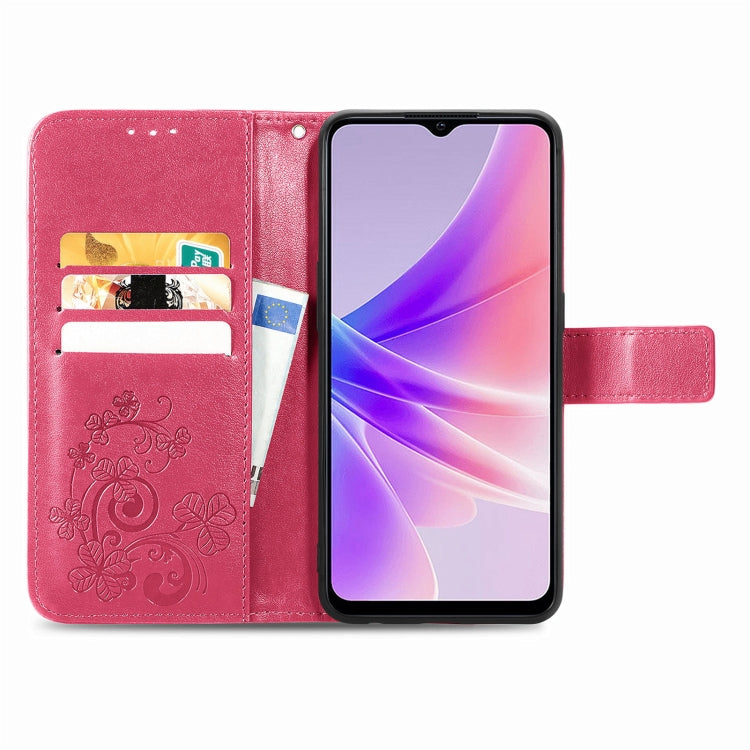 Magenta wallet phone case with embossed floral detail, card slots, and flip cover