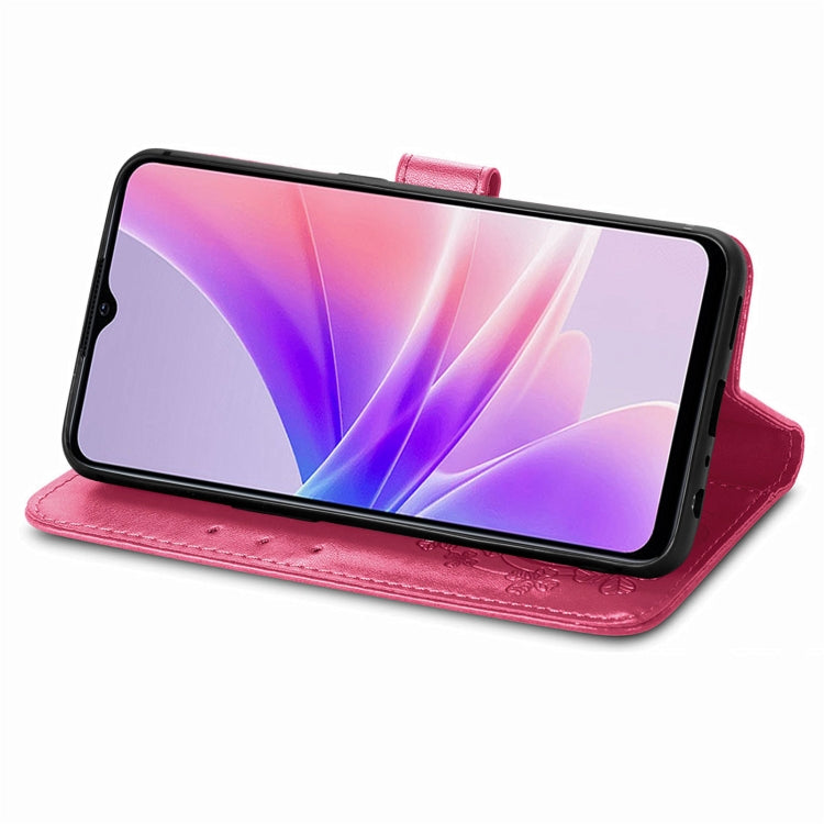 Magenta folio phone case with embossed floral detail and stand for landscape viewing
