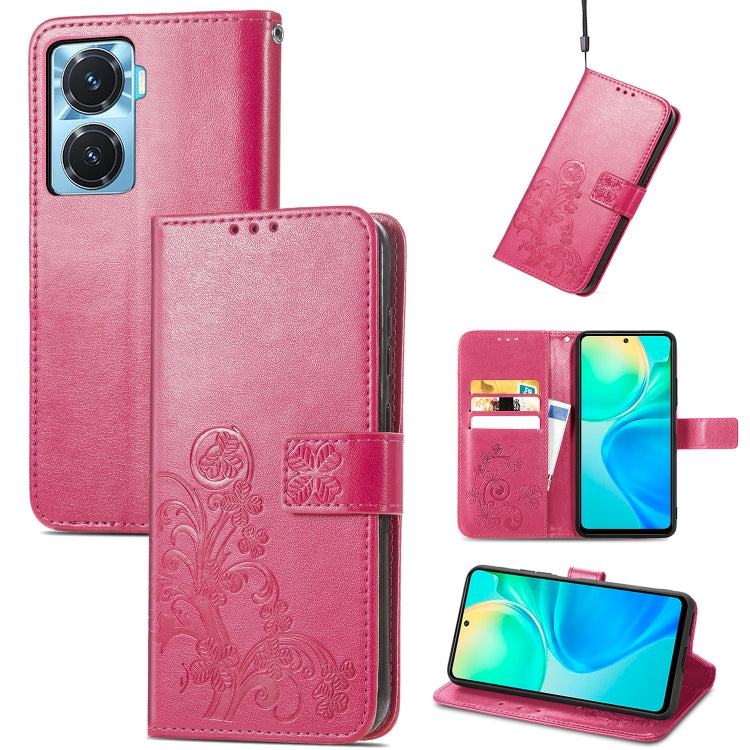 Pink embossed leather wallet phone case with four-leaf clasp buckle and card slots