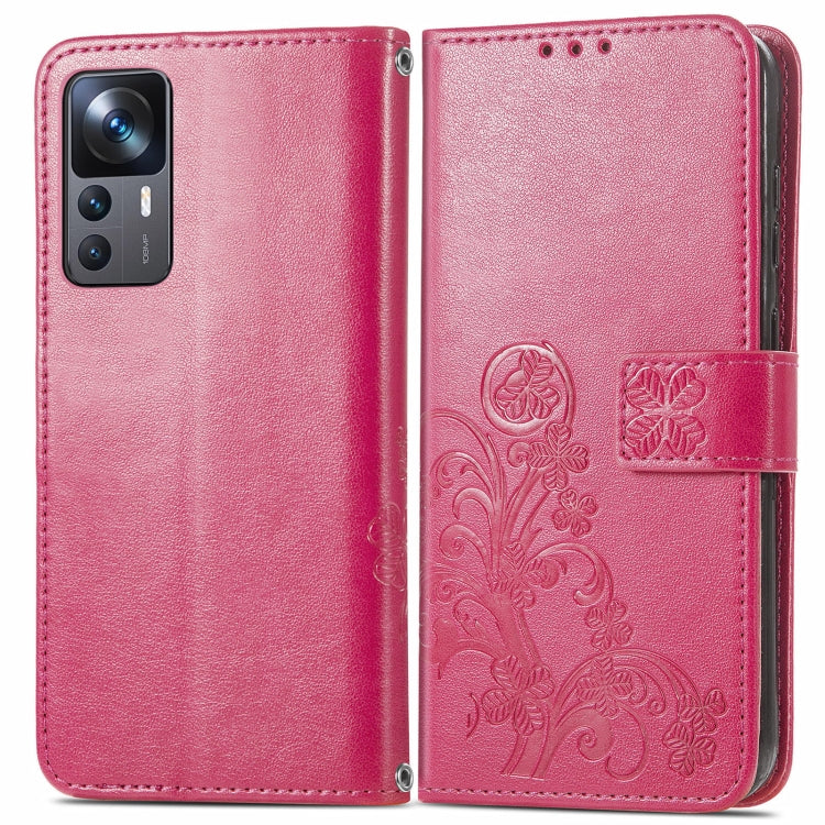 Rose red flip leather phone case with embossed four-leaf clasp and card slots