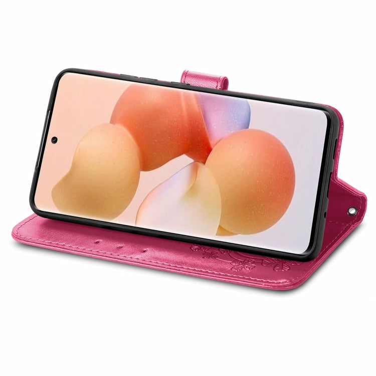 Rose red leather folio phone case with embossed four-leaf clasp, stand-ready flip