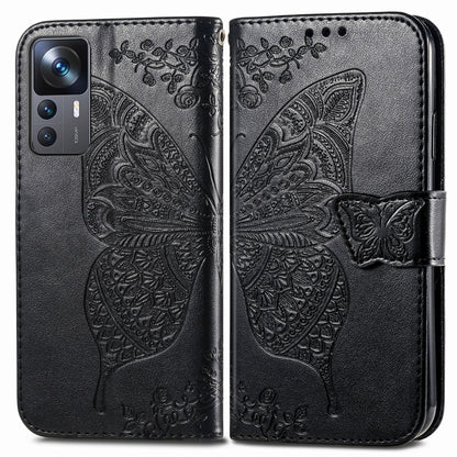 Black embossed butterfly and flower leather phone flip case with matching magnetic strap
