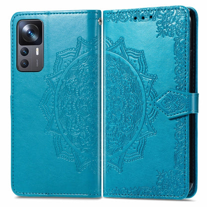 Blue embossed mandala leather folio phone case with flip cover and side button cutout