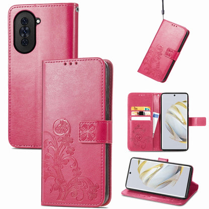 Magenta leather phone case with embossed four-leaf design and clasp, with card slots