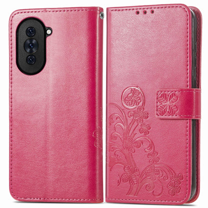 Pink leather wallet-style phone case with embossed floral pattern and secure clasp strap
